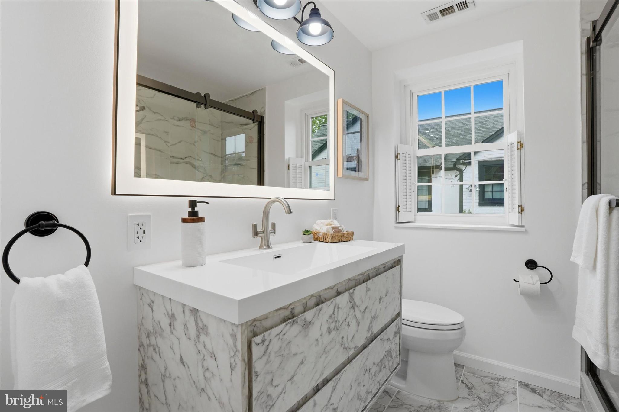 518 Winding Way Merion Station, PA 19066 - Photo 26 of 40 Renovated Hall Bathroom