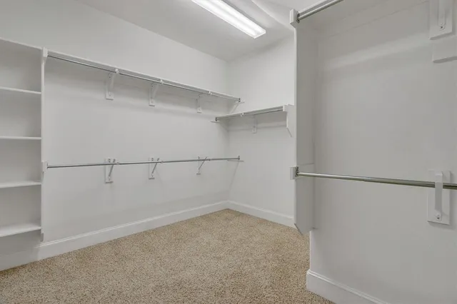 a view of an empty walk in closet
