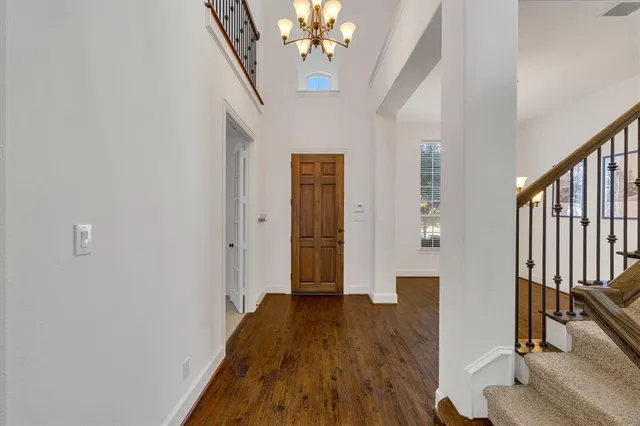 a view of entryway with wooden floor