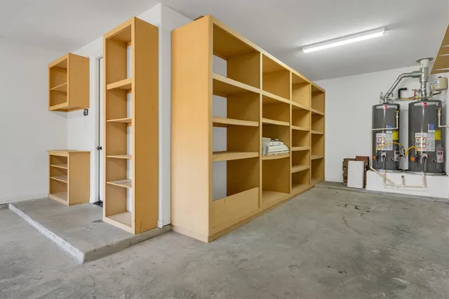 a view of a livingroom with furniture and a window