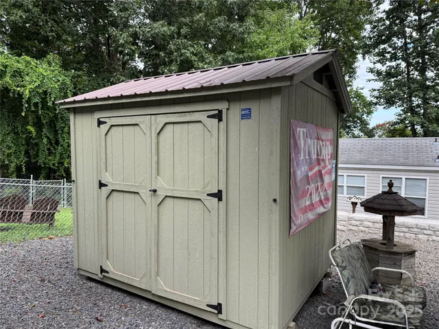 a view of a patio in back yard of the house