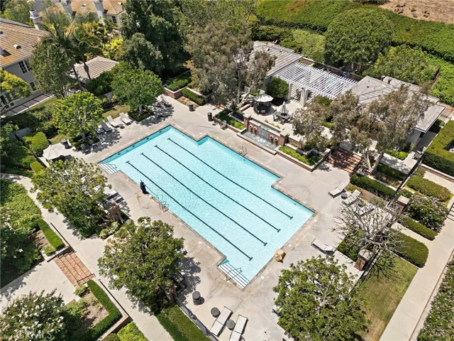 a view of a street with houses on both side