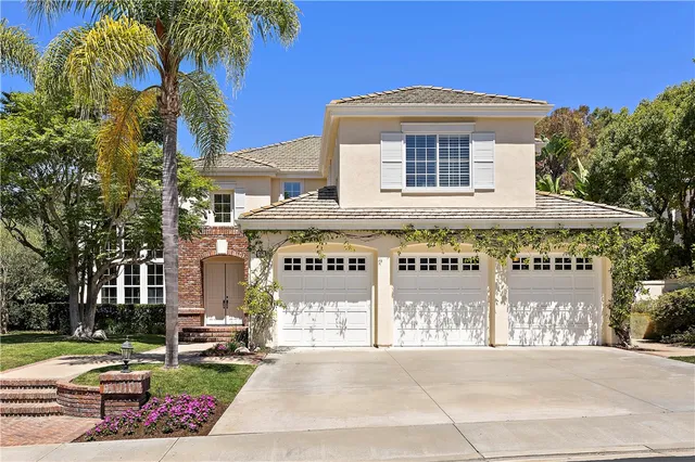 a front view of a building with garden