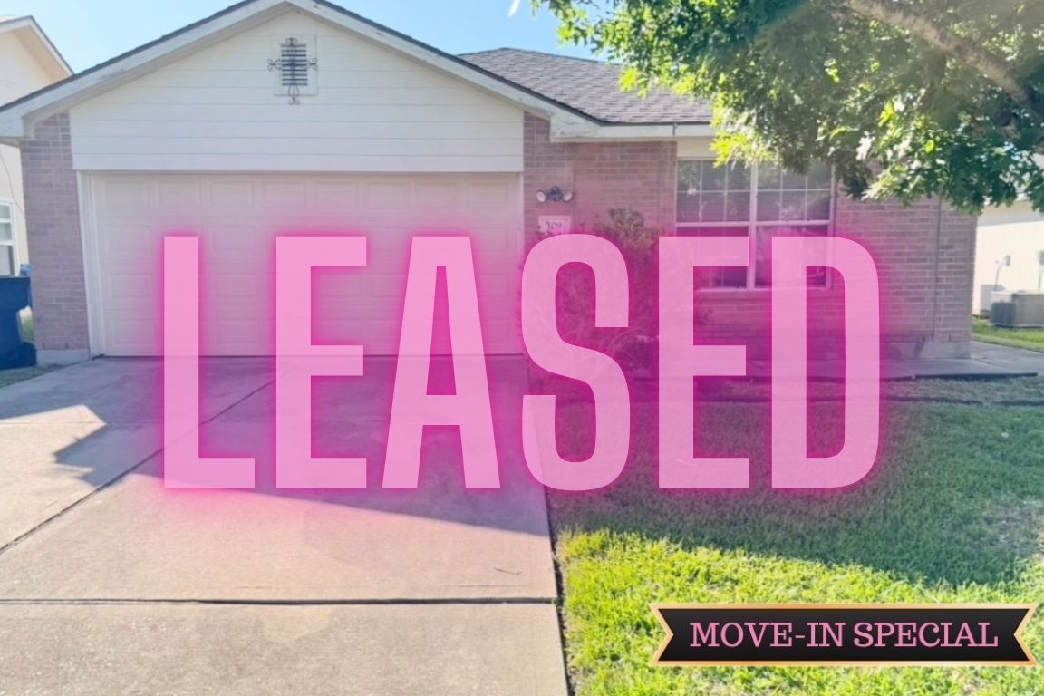 a sign that is on the wall of the building