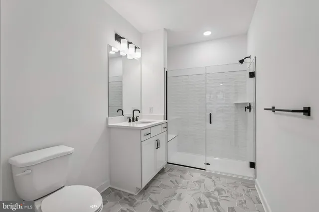 a view of a hallway with washer and dryer