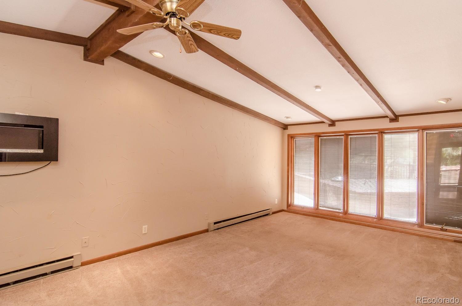 31463 Upper Bear Creek Road Evergreen, CO 80439 - Photo 11 of 23 a view of an empty room with a window