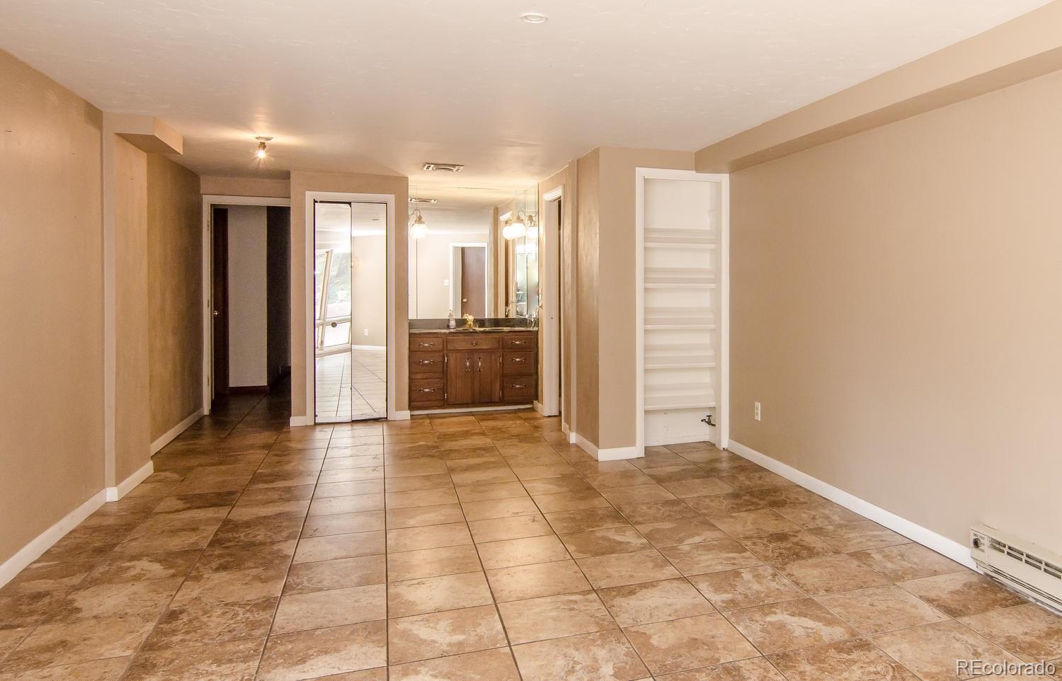 31463 Upper Bear Creek Road Evergreen, CO 80439 - Photo 20 of 23 a view of entryway with kitchen