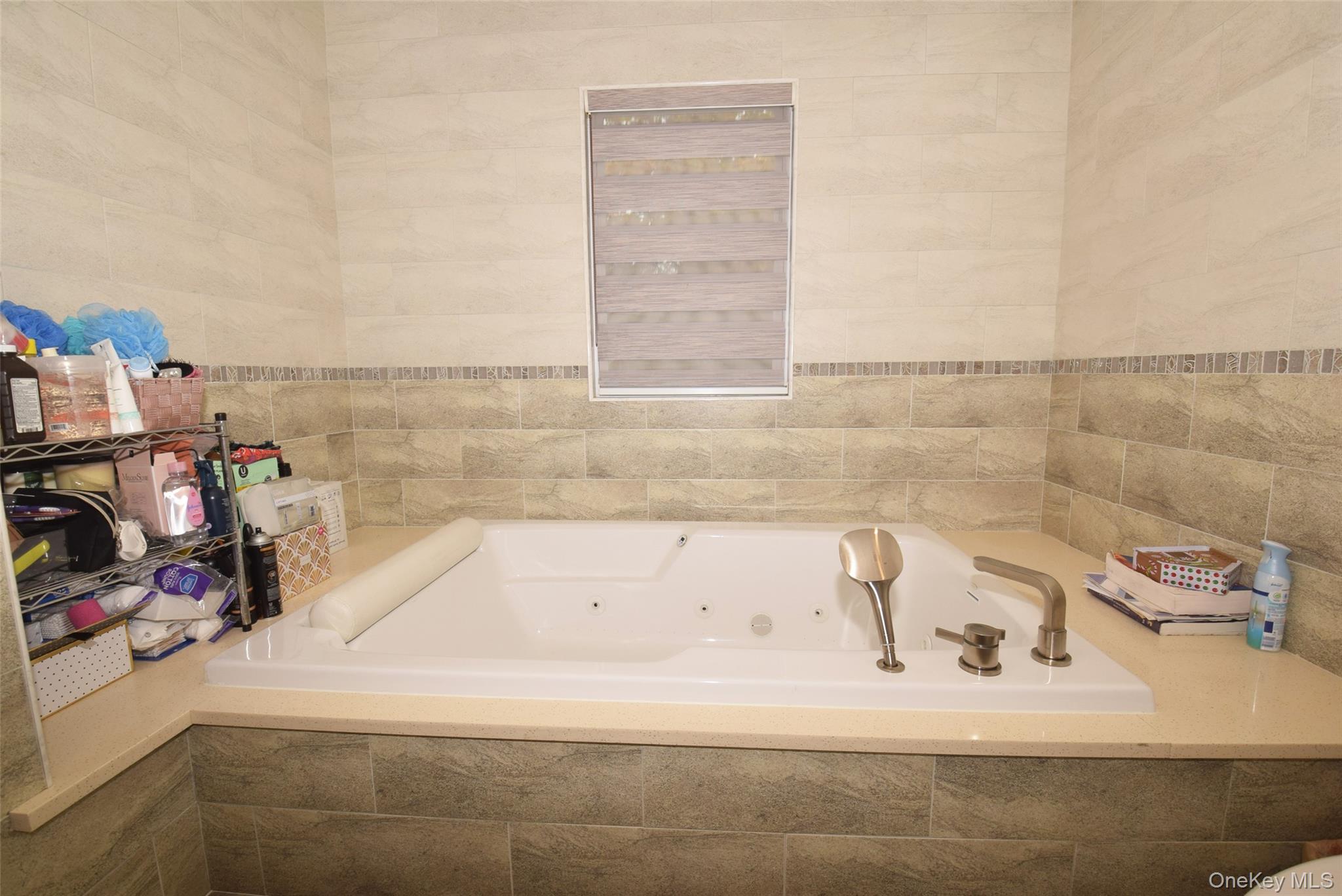 1-10 82nd Avenue Queens, NY 11415 - Photo 34 of 50 a bathroom with a bathtub