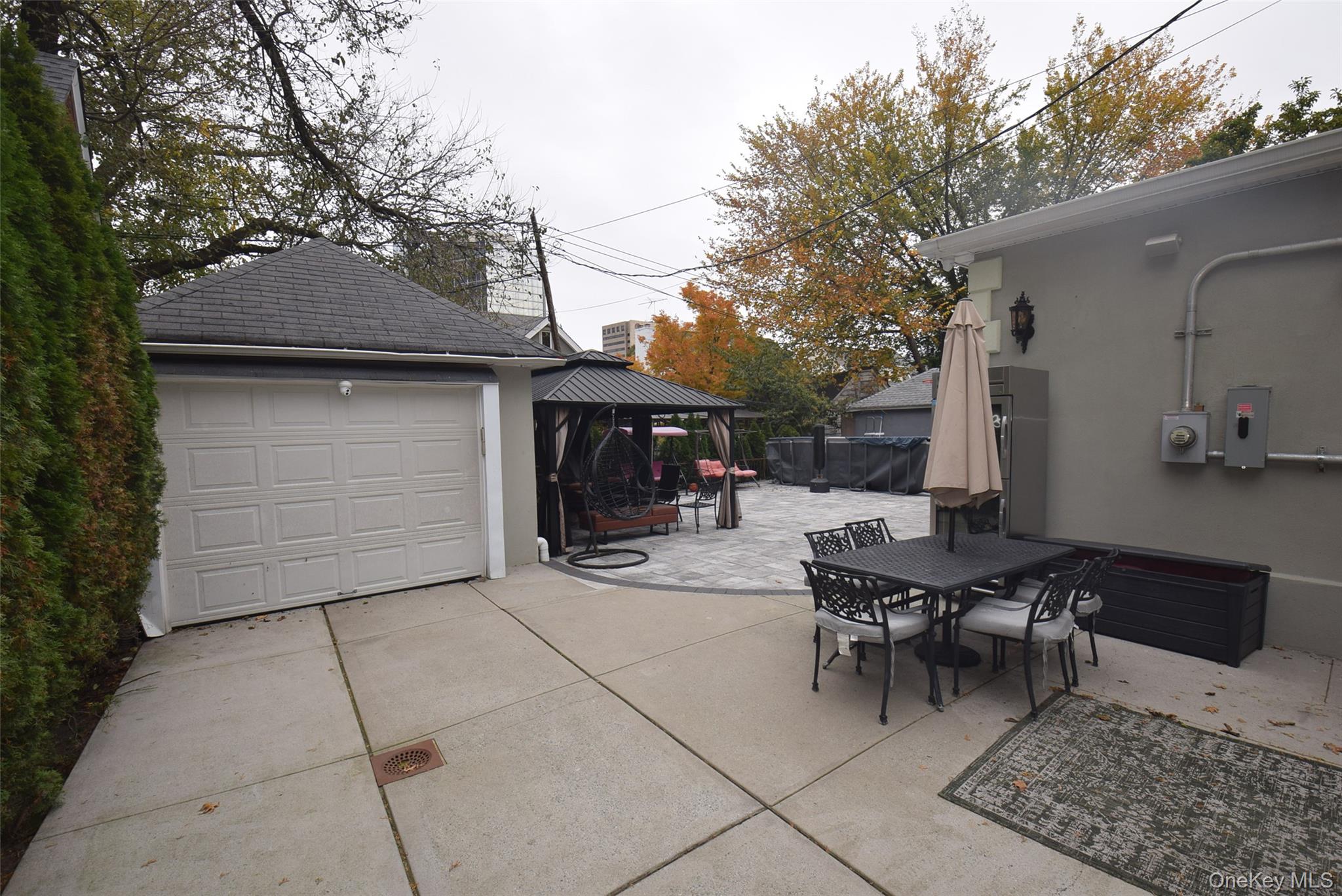 1-10 82nd Avenue Queens, NY 11415 - Photo 49 of 50 a view of house with outdoor seating space