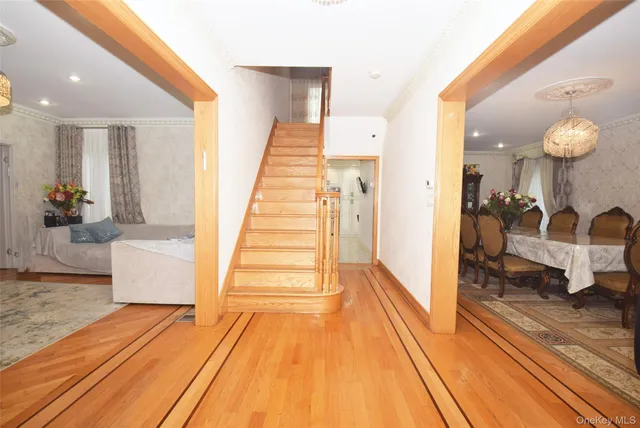 a view of a living room and entry way