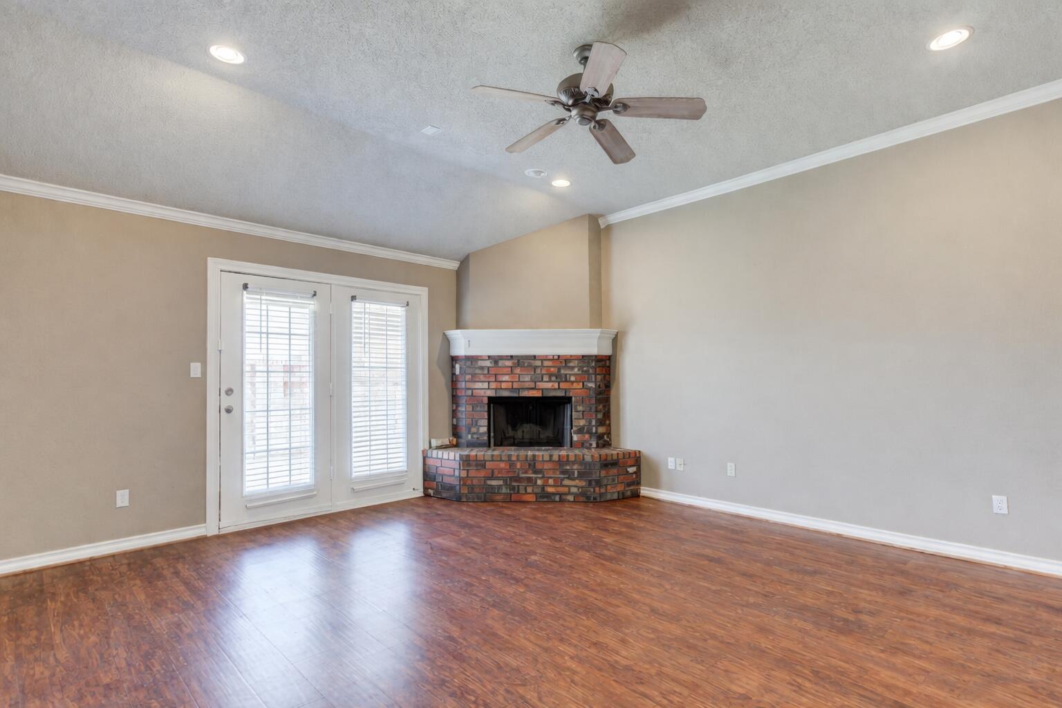5801 110th Street Lubbock, TX 79424 - Photo 2 of 38 5801-110th-St_Lubbock-TX_31_Living-Room