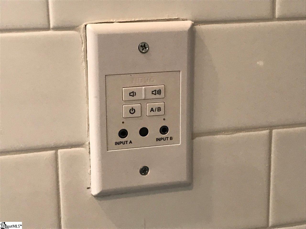 216 Donemere Way Fountain Inn, SC 29644 - Photo 16 of 32 Controls for built-in kitchen ceiling speakers.