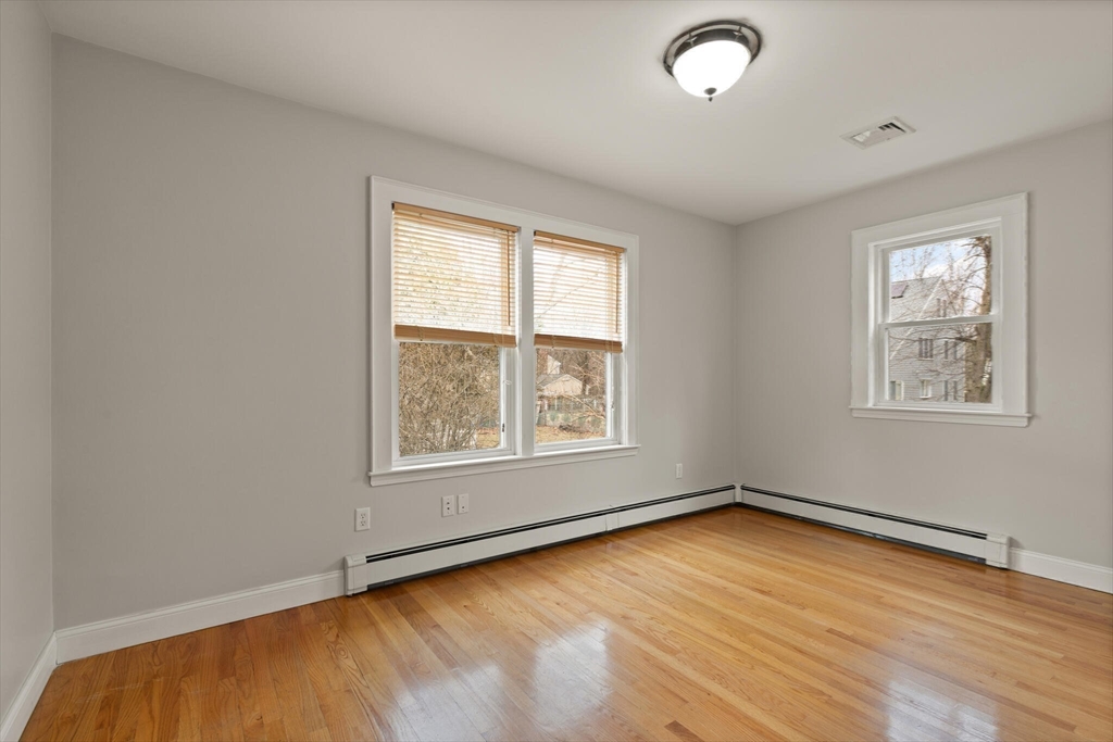 59 Reed Street Lexington, MA 02421 - Photo 15 of 32 an empty room with a window