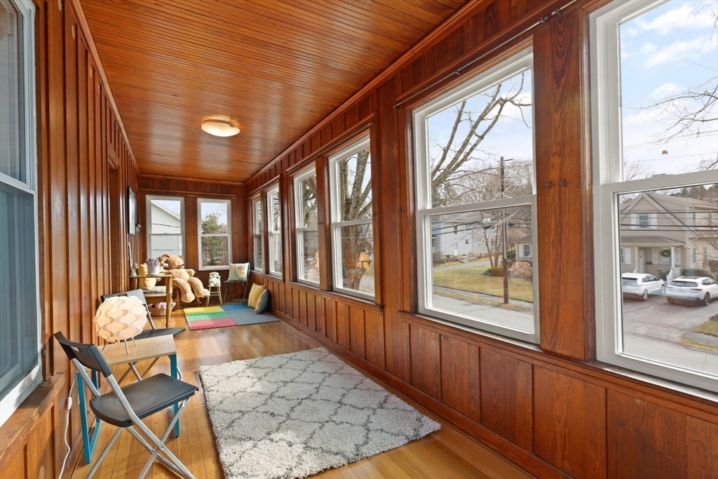 59 Reed Street Lexington, MA 02421 - Photo 23 of 32 a living room with large windows