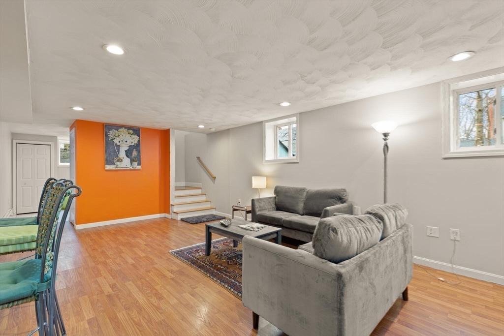 59 Reed Street Lexington, MA 02421 - Photo 27 of 32 a living room with furniture and a window