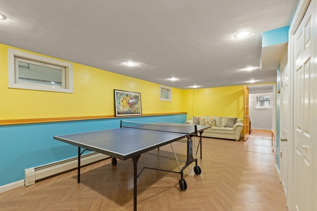 59 Reed Street Lexington, MA 02421 - Photo 28 of 32 a view of a room with furniture and wooden floor
