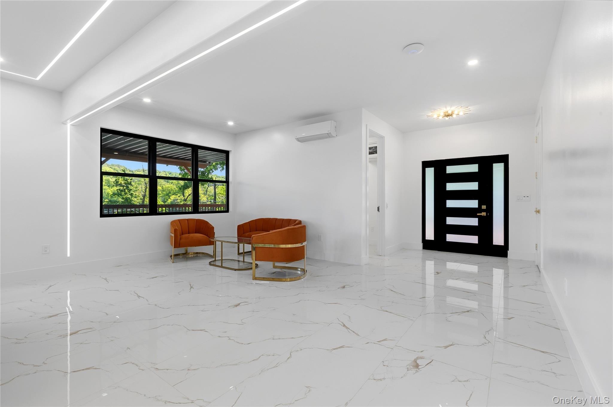 548 Lakes Road Monroe, NY 10950 - Photo 13 of 50 a view of room with projector and furniture