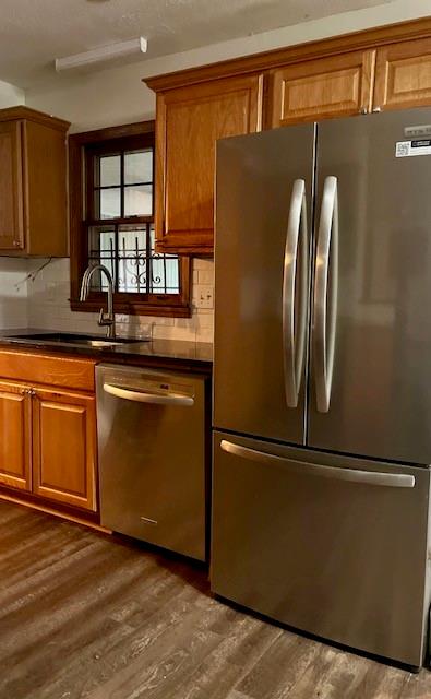 478 Crumbley Road McDonough, GA 30252 - Photo 4 of 7 a kitchen with stainless steel appliances granite countertop a refrigerator and a sink