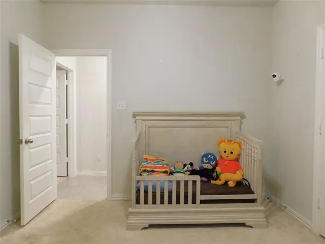 a room with toys and dresser