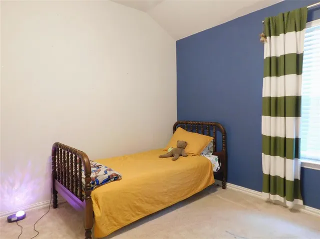 an empty room with closet area