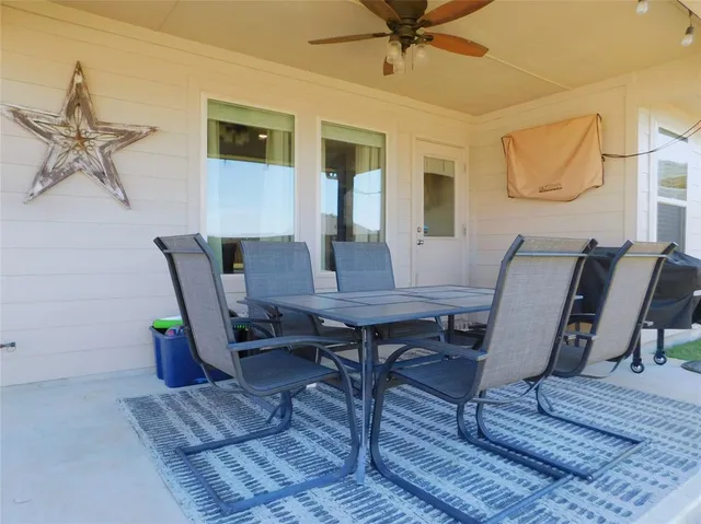 a view of a outdoor seating area with furniture