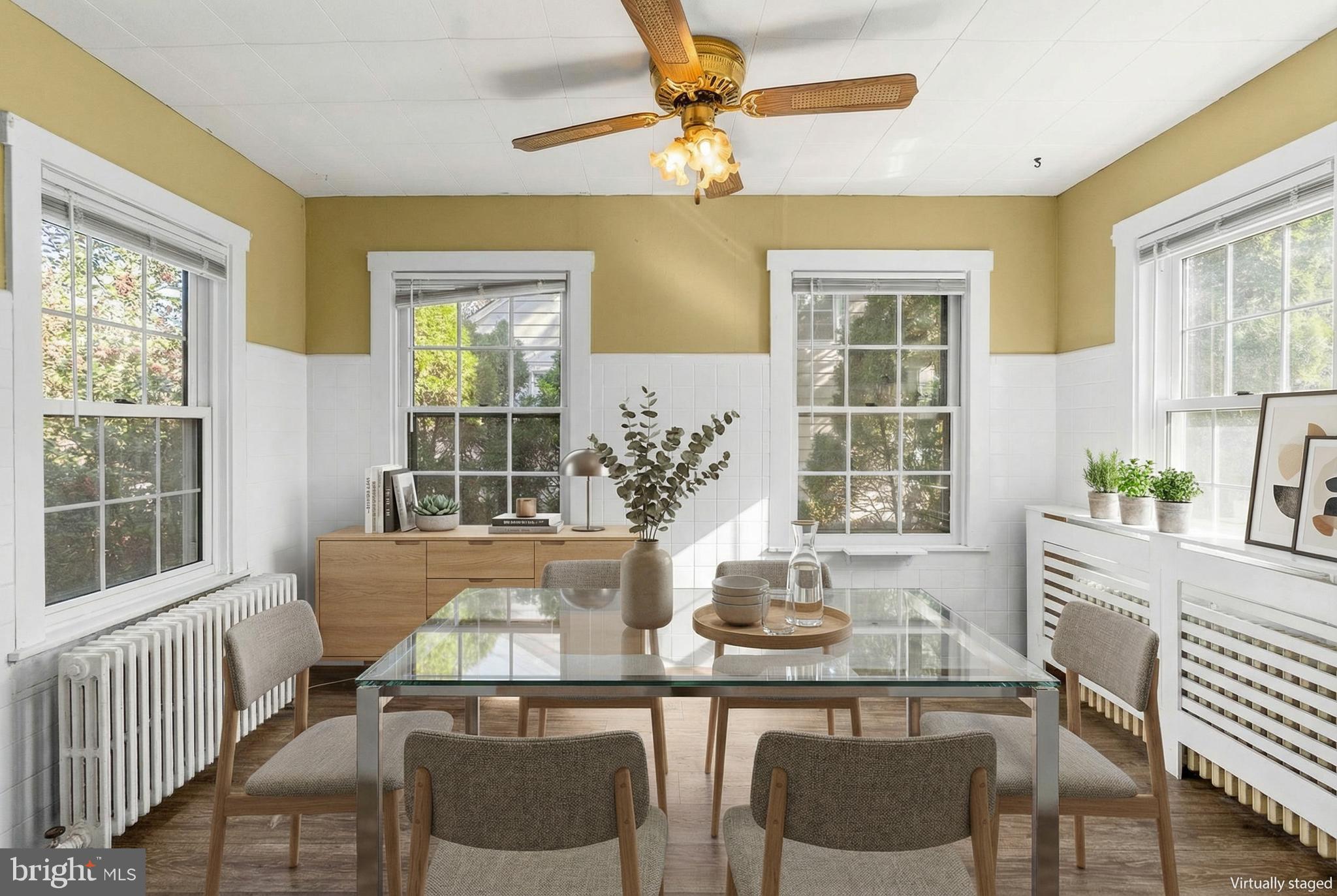 292 C Street Carneys Point, NJ 08069 - Photo 12 of 37 a dining room with furniture a chandelier and wooden floor