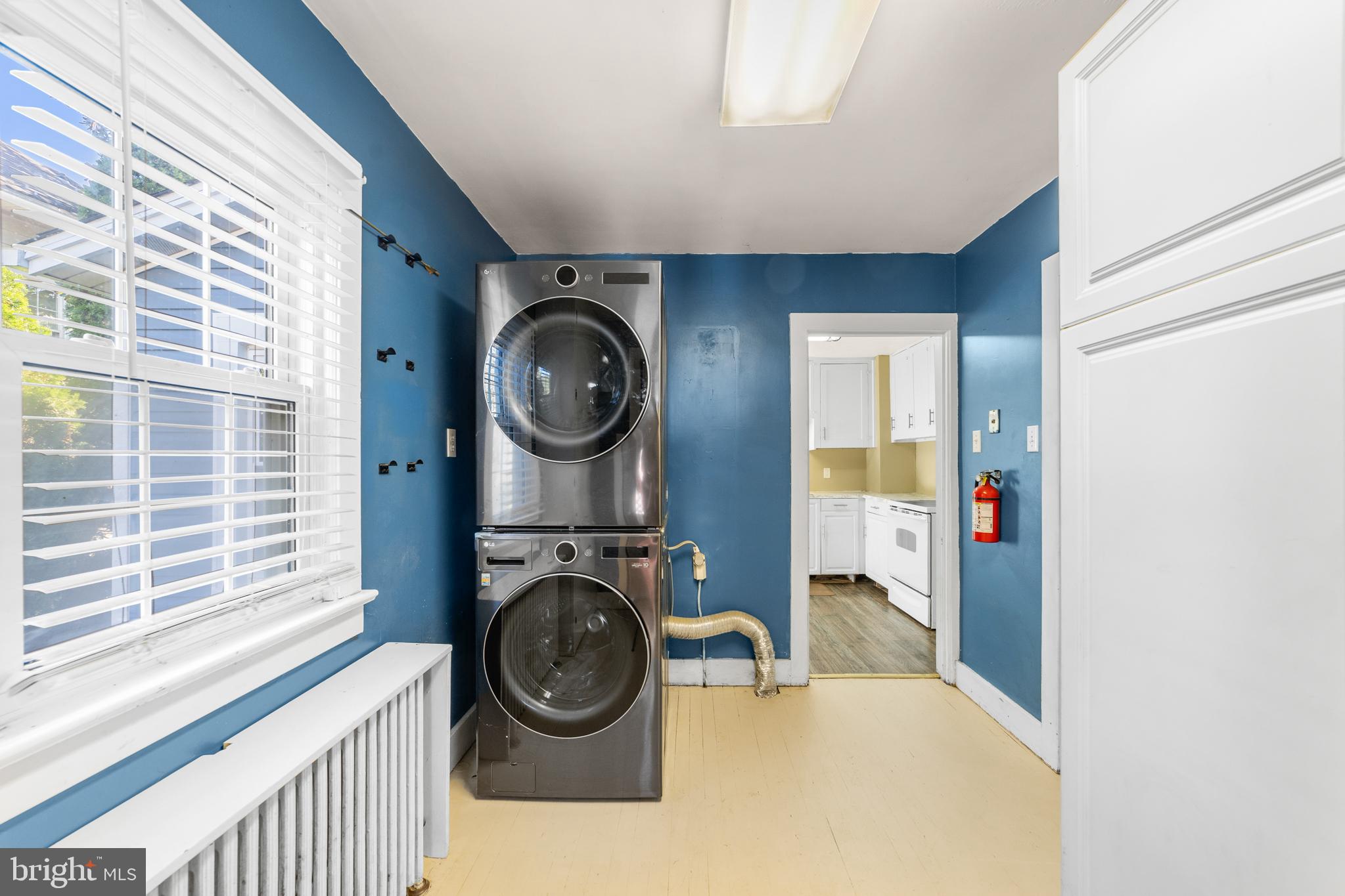 292 C Street Carneys Point, NJ 08069 - Photo 14 of 37 a view of a bedroom with washer and dryer