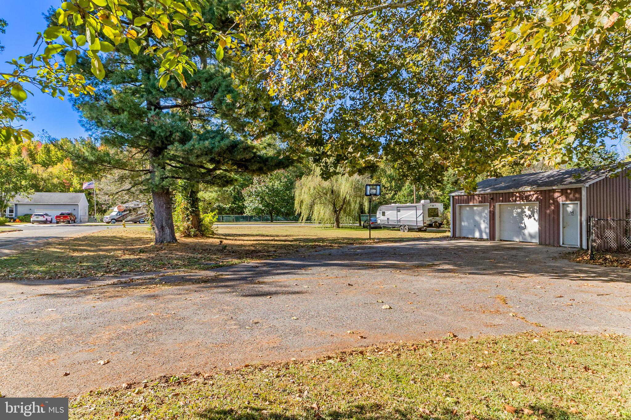 292 C Street Carneys Point, NJ 08069 - Photo 26 of 37 a view of road with large trees
