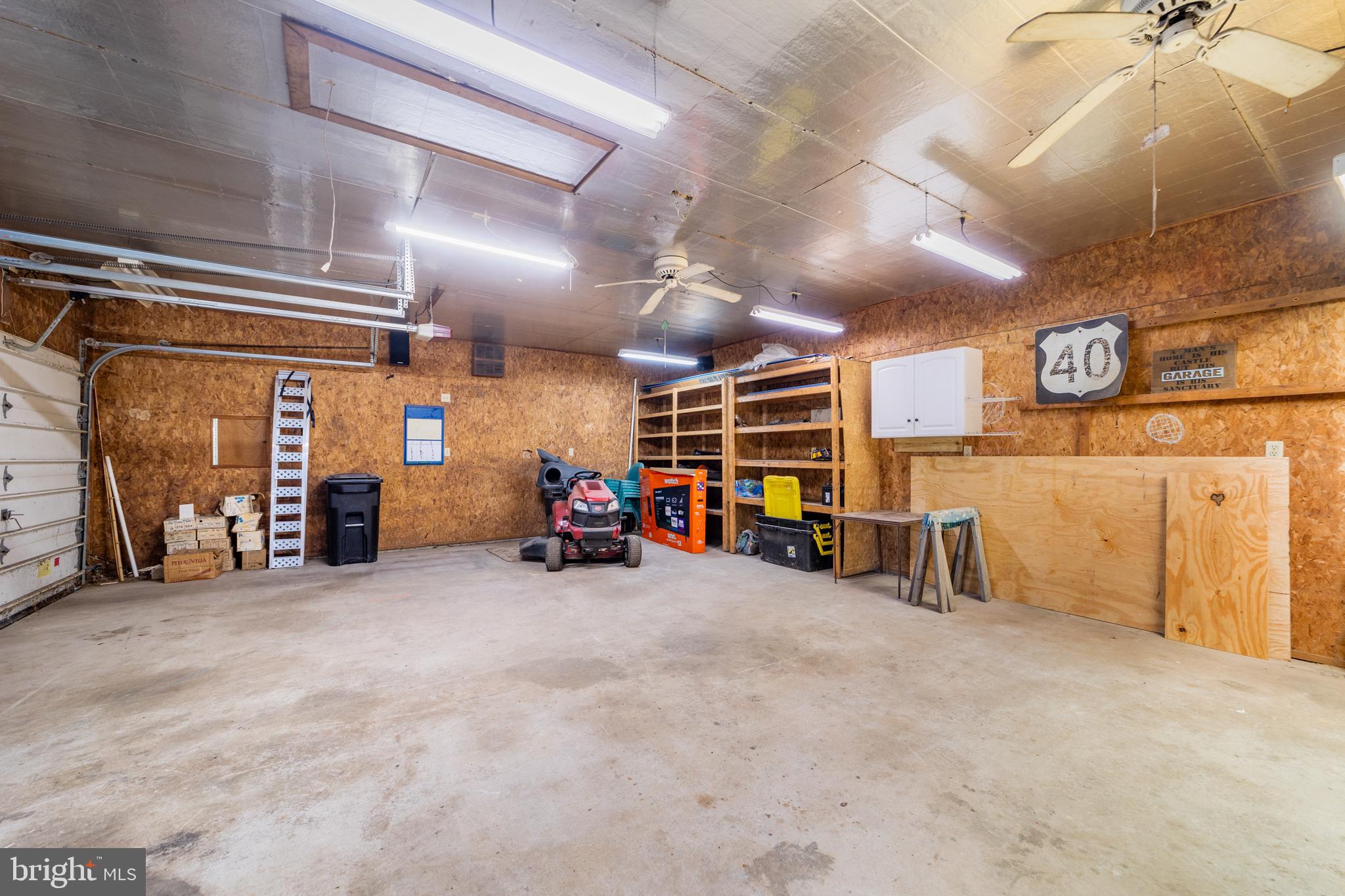 292 C Street Carneys Point, NJ 08069 - Photo 27 of 37 a view of a garage with furniture