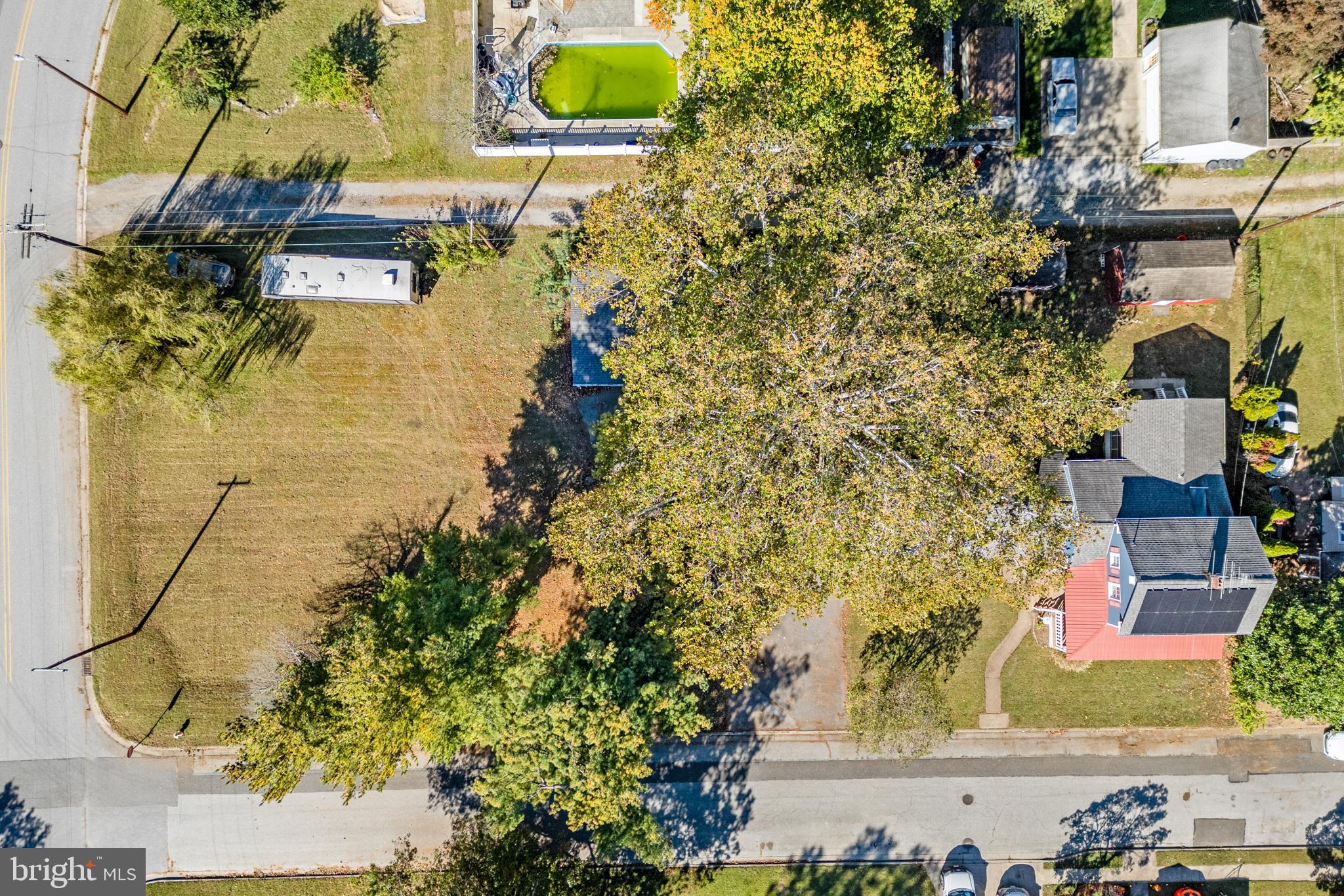 292 C Street Carneys Point, NJ 08069 - Photo 35 of 37 a aerial view of a residential apartment building with a yard