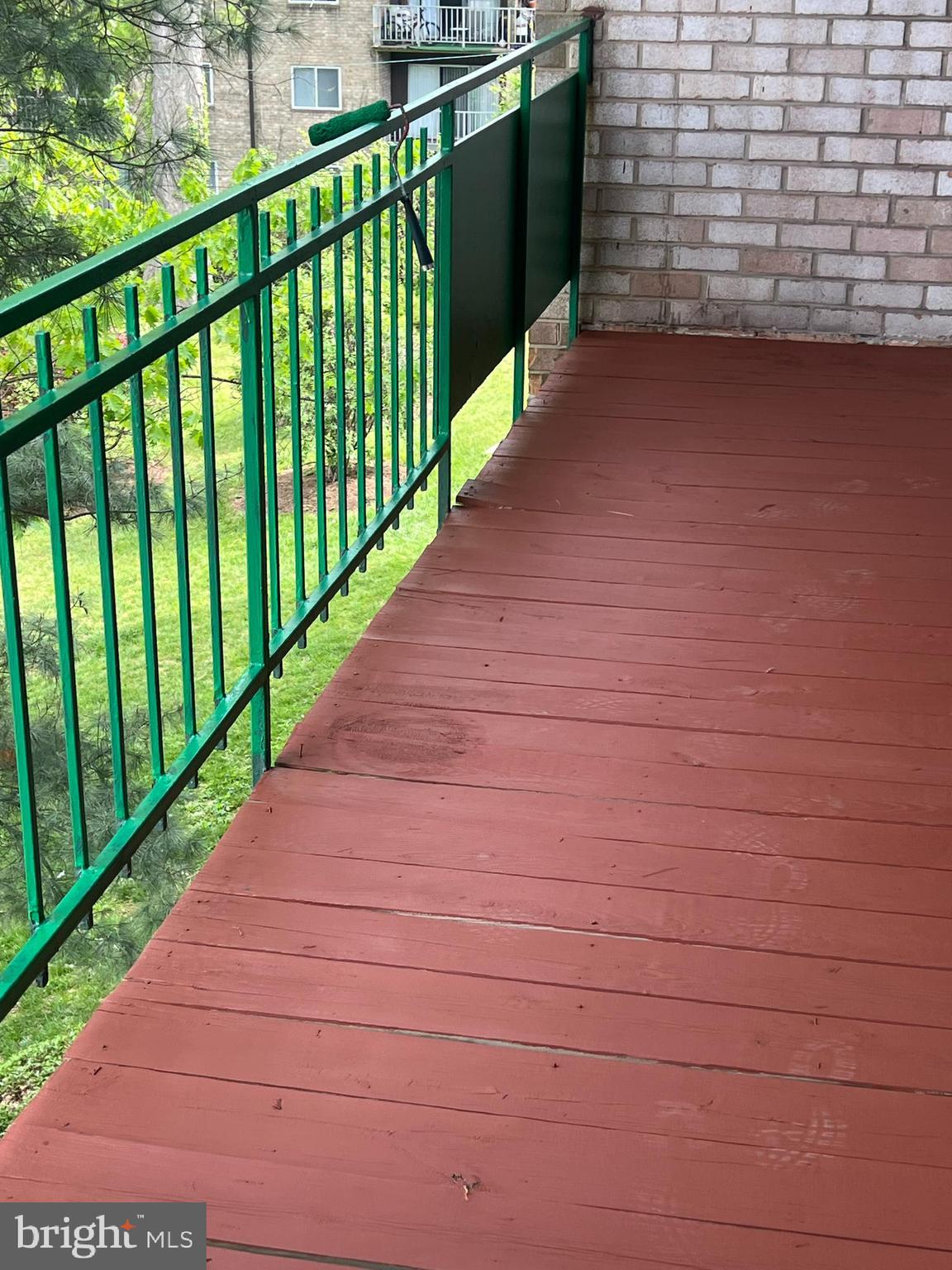 9274 Adelphi Road, Unit 202 Hyattsville, MD 20783 - Photo 16 of 25 a view of a pathway both side of building
