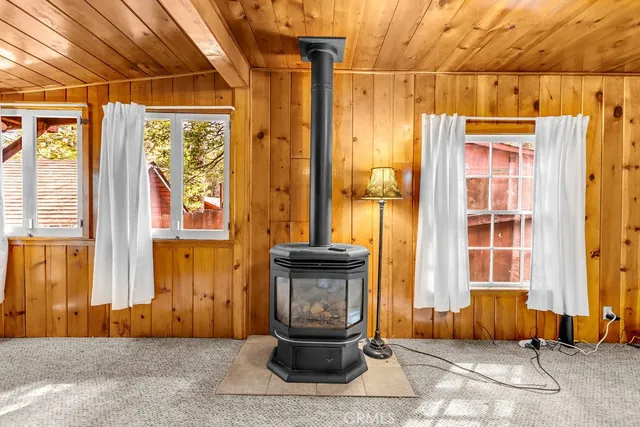 a living room with a couch and a window