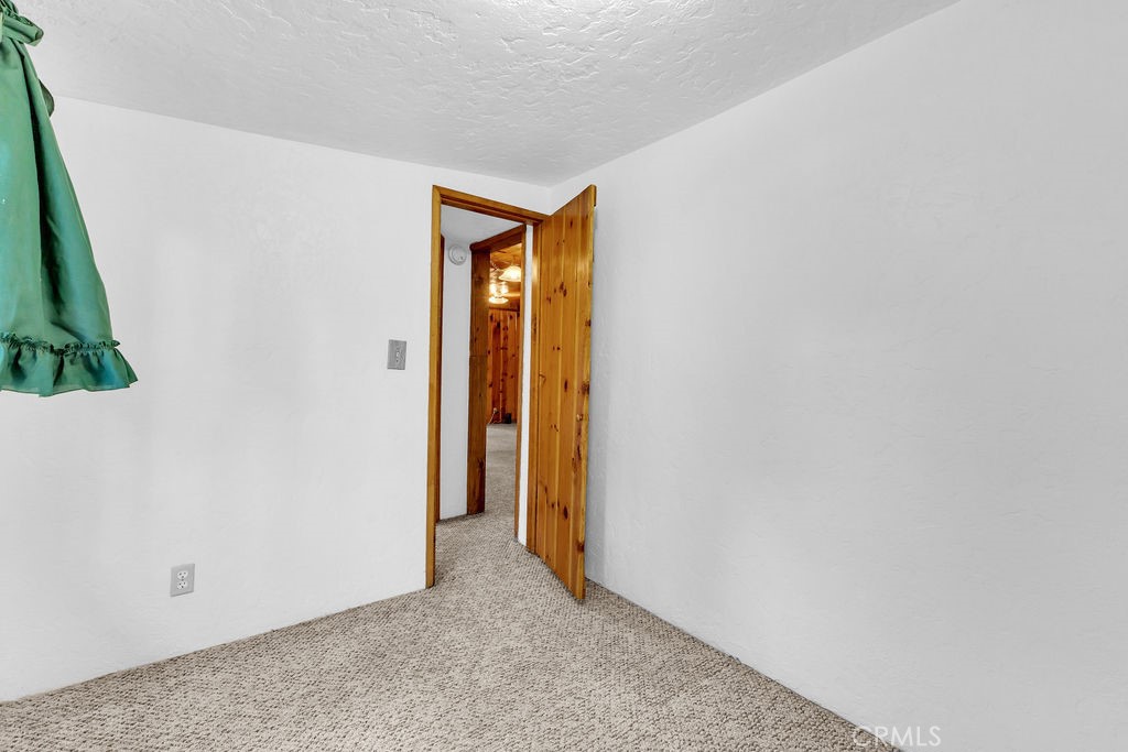 53705 Country Club Drive Idyllwild, CA 92549 - Photo 18 of 26 a view of an empty room