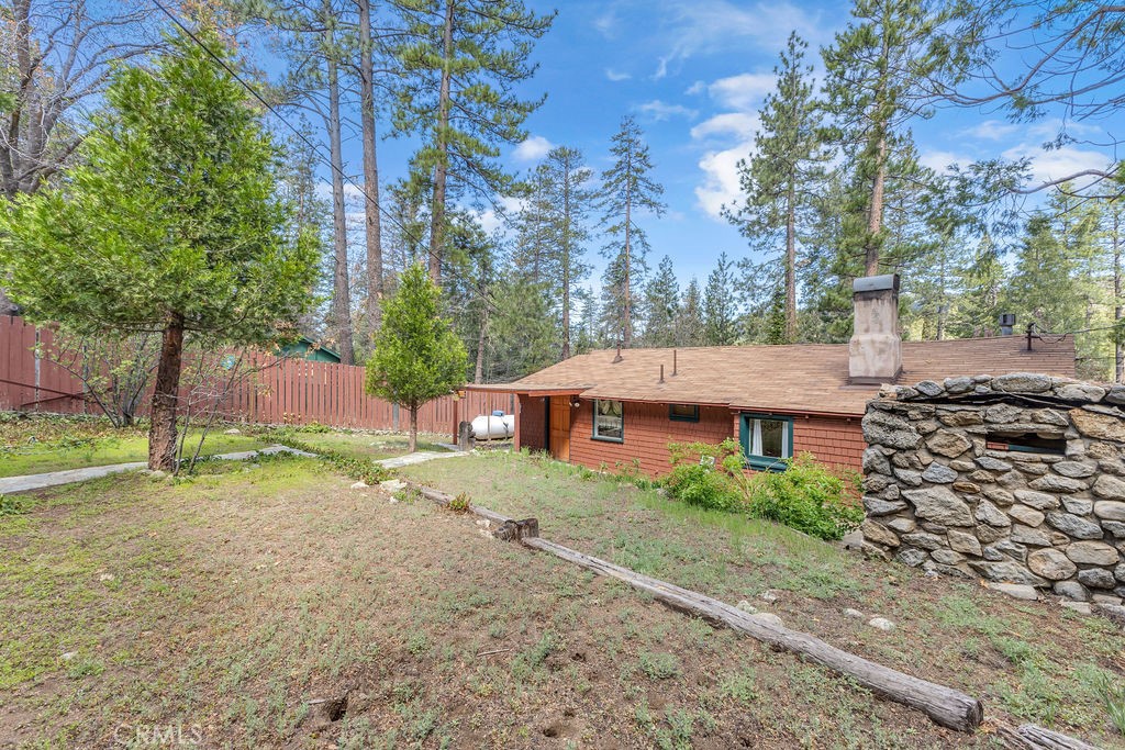 53705 Country Club Drive Idyllwild, CA 92549 - Photo 21 of 26 a aerial view of a house with a yard and large trees