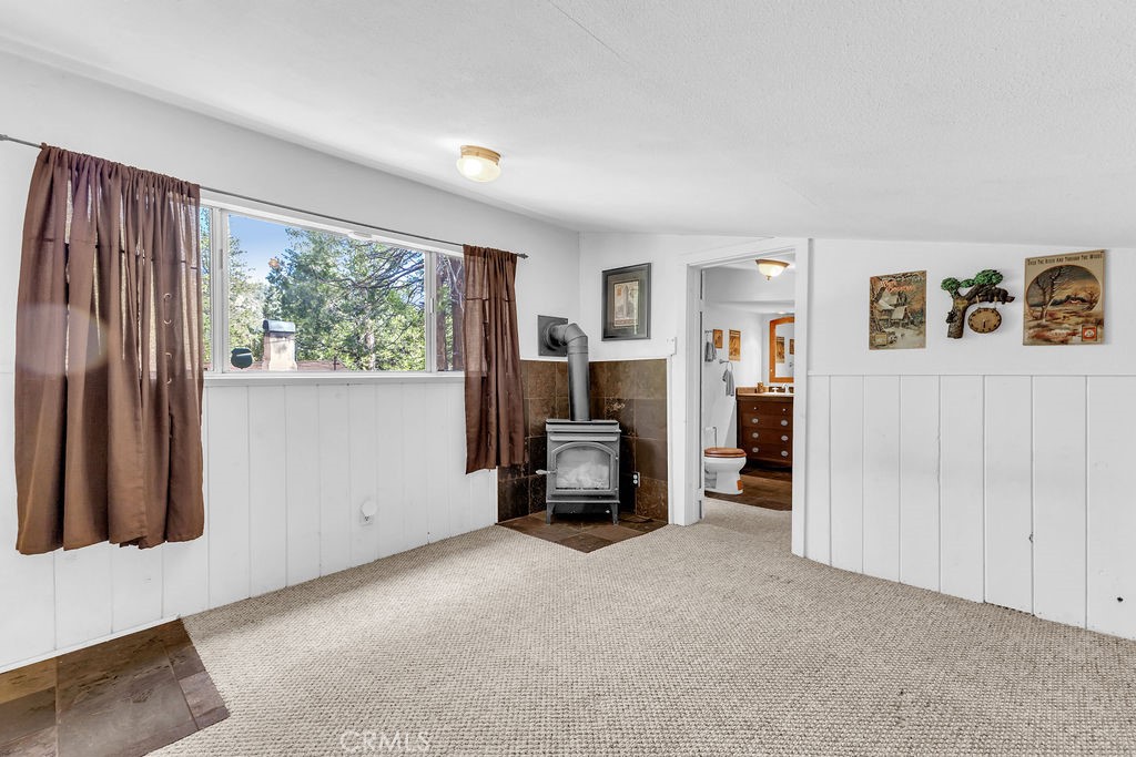 53705 Country Club Drive Idyllwild, CA 92549 - Photo 24 of 26 a view of a livingroom with furniture and windows