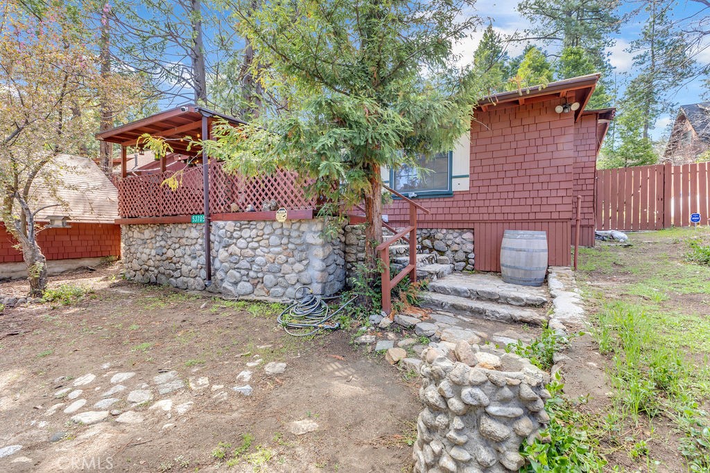 53705 Country Club Drive Idyllwild, CA 92549 - Photo 4 of 26 a view of a yard with an outdoor and trees