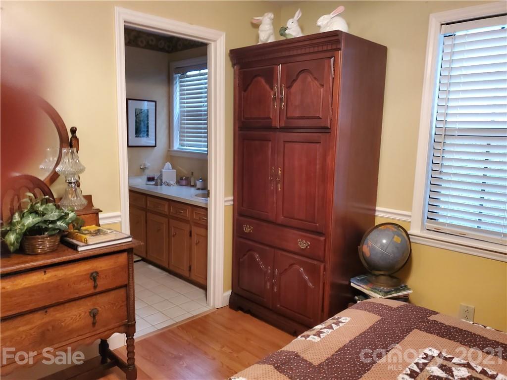 1856 Wesley Road Morganton, NC 28655 - Photo 5 of 7 a workspace with cabinets and wooden floor