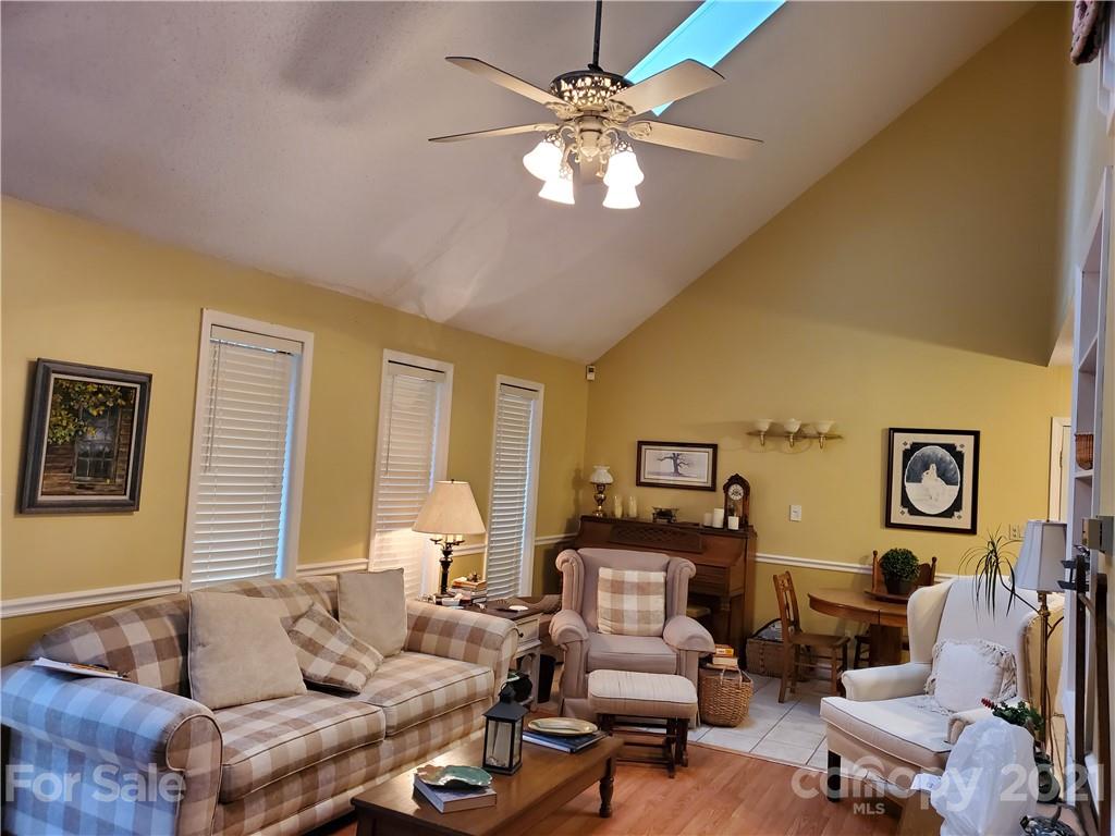 1856 Wesley Road Morganton, NC 28655 - Photo 7 of 7 a living room with furniture or couch and a chandelier