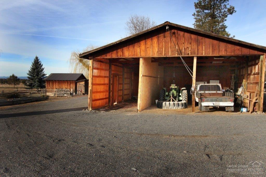 10473 Southwest Cornett Loop Powell Butte, OR 97753 - Photo 22 of 24 Back of shop. Hay and equipment storage.