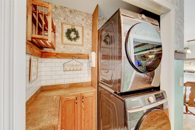 a utility room with dryer and washer