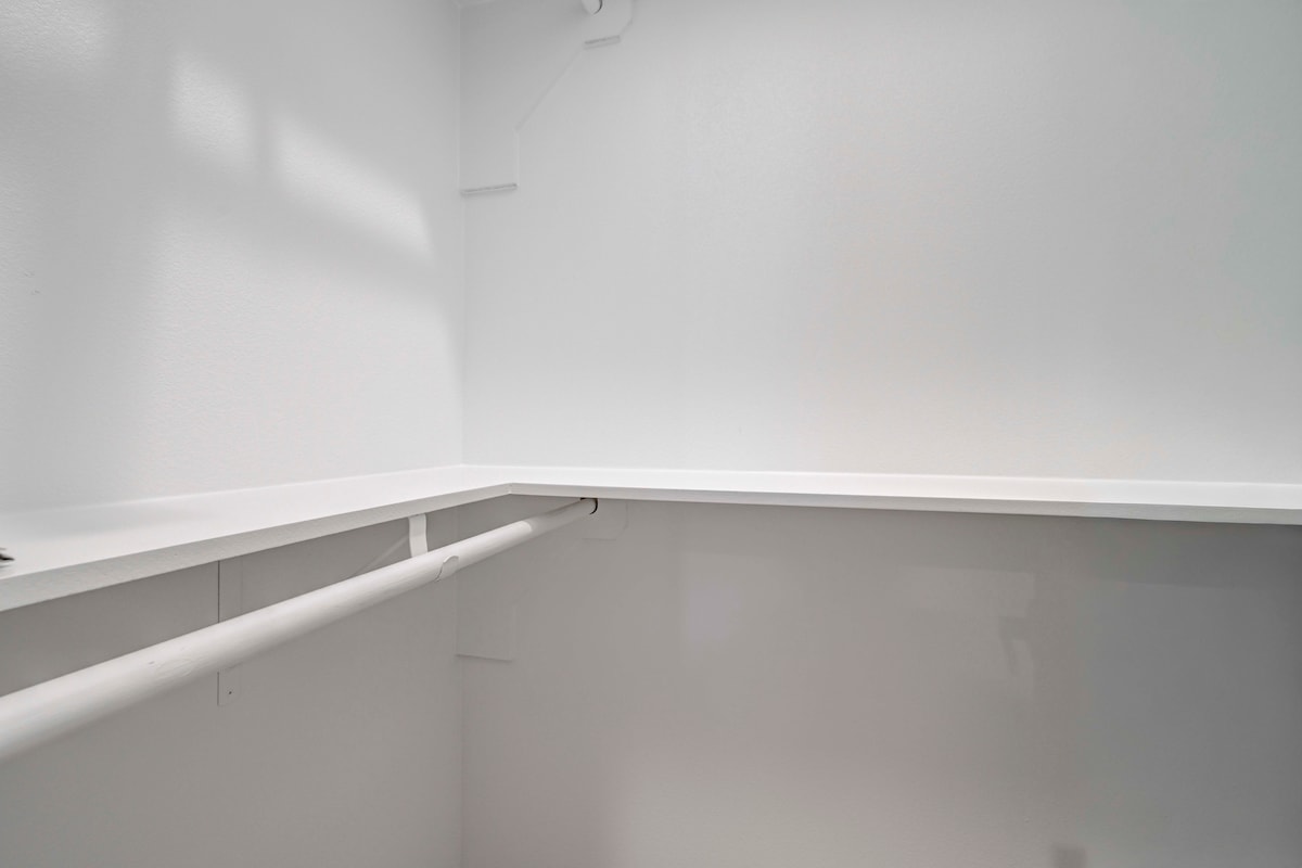 2220 Yellow Jacket Lane, Unit 1 Austin, TX 78741 - Photo 31 of 35 Functional built-in shelving provides abundant storage and organization within this well-appointed closet space.