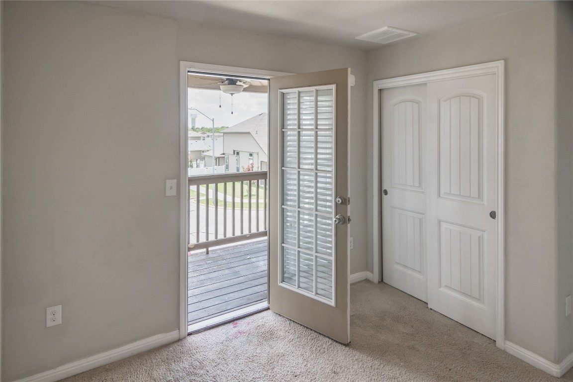 332 Cane River Road Pflugerville, TX 78660 - Photo 12 of 30 an empty room with windows