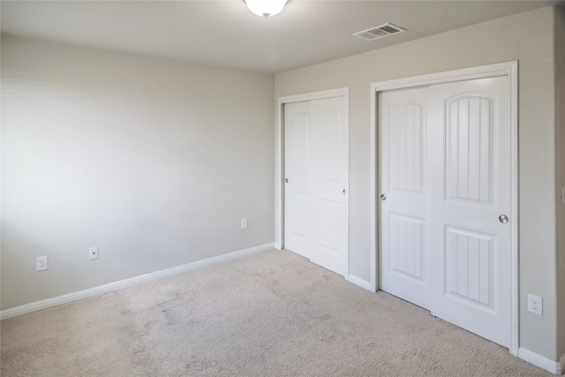 332 Cane River Road Pflugerville, TX 78660 - Photo 16 of 30 a view of an empty room and closet area