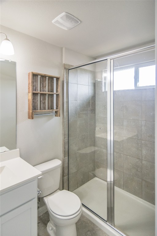 332 Cane River Road Pflugerville, TX 78660 - Photo 19 of 30 a bathroom with a shower a toilet and sink