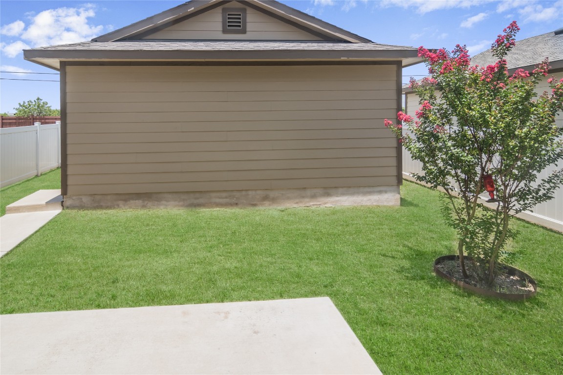 332 Cane River Road Pflugerville, TX 78660 - Photo 26 of 30 a front view of a house with a yard