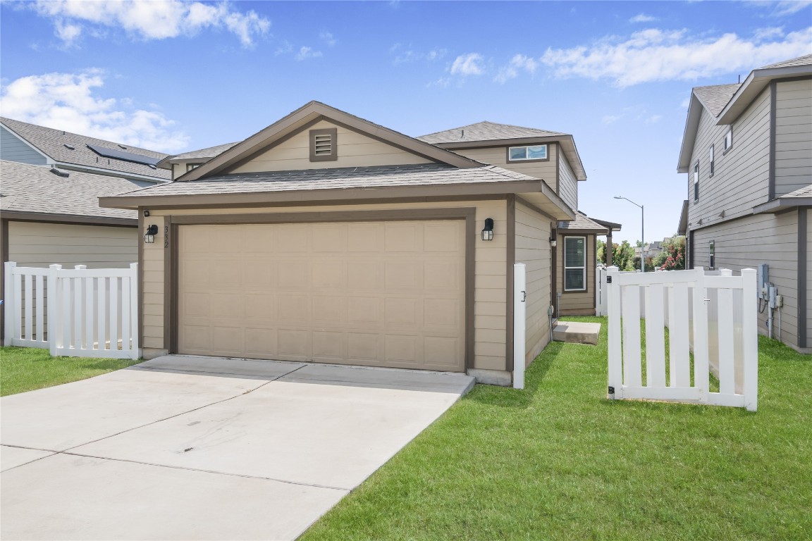 332 Cane River Road Pflugerville, TX 78660 - Photo 29 of 30 a front view of a house with a yard