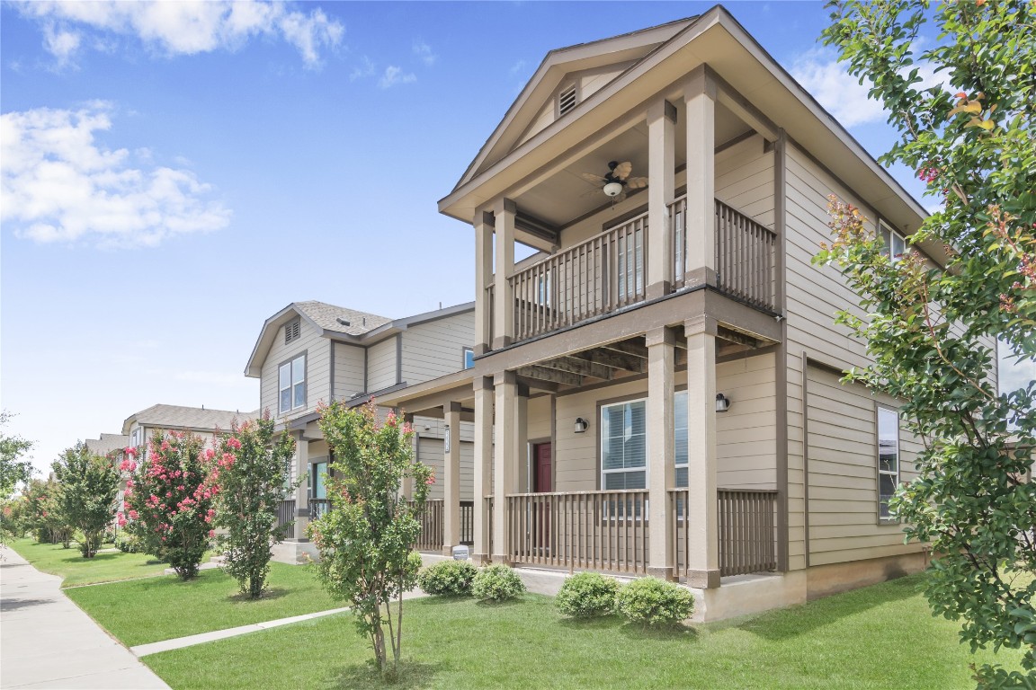 332 Cane River Road Pflugerville, TX 78660 - Photo 3 of 30 a front view of a house with a yard