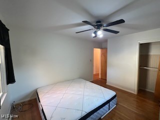 2375 Burnham Road Akron, OH 44333 - Photo 24 of 39 Bedroom featuring hardwood floors, ceiling fan, and closet
