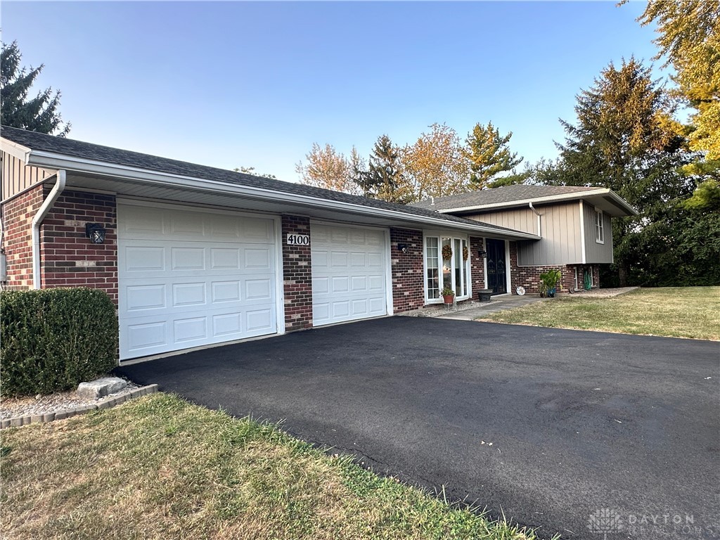 4100 Dayton Springfield Road Springfield, OH 45502 - Photo 4 of 69 New black top, garage doors and openers inside