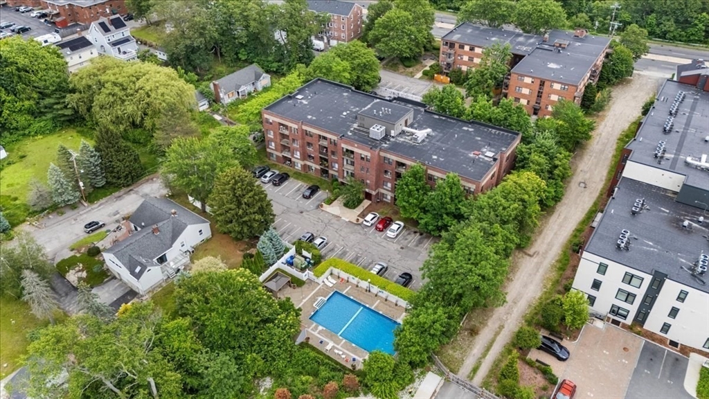 4925 Washington Street, Unit 304 Boston, MA 02132 - Photo 21 of 25 an aerial view of a city
